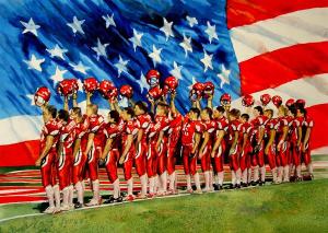 Football players in front of American Flag