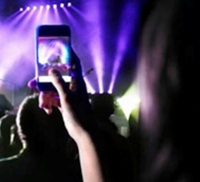 Image of camera phone at concert